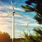 Wind Turbine - Source: Gaudilab. White Wind Turbine Located Outside the City. Digital Image. Shutterstock, [Date Published Unknown]